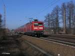 112 185-4 zieht den RE 18107 nach Eisenhttenstadt bei Briesen (Mark) 08.03.11