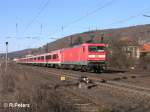 112 169-8 schiebt den RE Frankfurt/Main in den  Bahnhof Gemnden.