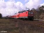 112 103-7 schiebt bei Berlin-Friedrichshagen den RE1 Magdeburg HBF.