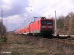 112 117 zieht bei Berlin-Friedrichshagen ein RE1 Frankfurt(Oder).