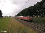 112 188-8 schiebt bei Jacobsdorf(Markt) ein RE nach Berlin.