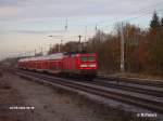 114 010-3 schiebt ein RE1 Brandenburg bei Berlin-Friedrichshain.