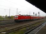 143 306-9 shciebt den RB11 Frankfurt/Oder in den Bahnhof Eisenhttenstadt.