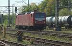 SRLS 143 020 lauft am herrlichen 26 April 2025 um in Bad Bentheim. Die von dieser 'Himbeerroter Lady' angebrachter Keselzug wird ein Tag später in die Nieder;lande fahren mit einer RFO 1800.