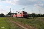 151 043-7 und 006-4 mit einen sehr langen Kesselzug bei der Stromkreistrennstelle Bischofsheim.