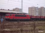 155 034-2 steht mit ein Seitenkippzug in Eisenhttenstadt.