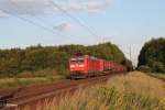 185 106-2 zieht im herrlichen Abendlicht einen Winner Spedition Wechselpritschenzug bei Mainz-Bischofsheim.