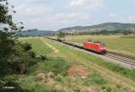 185 059-3 zieht einen gemischten Güterzug bei Großsachsen-Heddesheim in Richtung Mannheim/Heidelberg.