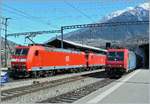 BR 185/640496/zwei-db-e-185-begegnen-in Zwei DB E 185 begegnen in Brig der SBB Re 484.017, die im Cisalpino Verkehr eingesetzt wird.
16. März 2007