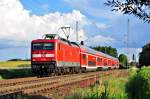 Mit dem RE4362 rollt die 112 101 am 25.06.2014 in Richtung Rostock Hbf.Hier iN Sildemow.