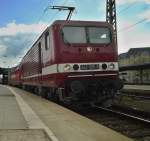 243 005-6 (143 005-7) stand zusammen mit WFL 228 501-3 im Hallenser Hauptbahnhof.