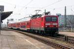 Die Trierer 143 910 mit dem RE13 (RE 17691) von Magdeburg Hbf nach Leipzig Hbf, bei der Ausfahrt aus Magdeburg-Neustadt.