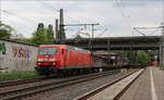 145 014 mit spärlich ausgelasteten Containerzug am 04.05.2024 in Hamburg Harburg.