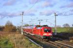 182 007 mit dem RE 4312,hier in Sildemow am 08.11.2015.