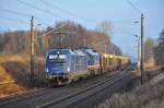 Mit einem Holzzug nach Stendal ist die 183 500 in Rostock-Bramow gestartet.M itgeschleppt wurde die 232 103 der Fa.Raildox.Am 14.02.2014 hat die Fahrt nach Stendal gerade erst begonnen.Hier in