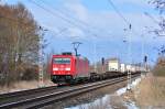 Die 185 316 befrderte am 25.03.2013 den KT 41911(Ros.Seehafen-Vels Vbf CCT).Hier in Sildemow.