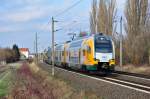 Der ET 445.103 der ODEG rauscht als RE 83974(Wismar-Cottbus) durch Schwerin-Medewege seinem nächsten Halt Schwerin hbf entgegen.