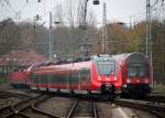 442 848-8 als S1 von Warnemnde nach Rostock Hbf bei der Einfahrt im Rostocker Hbf.15.11.2014