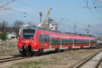 442 357 als S2 von Warnemnde nach Rostock Hbf bei der Einfahrt im Haltepunkt Warnemnde Werft.01.05.2015