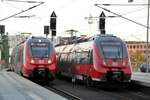 442 821 und 442 633 im Berliner Hauptbahnhof am 30.09.2013.