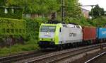 Captrain 185 543-6 mit Containerzug in HH-Harburg.