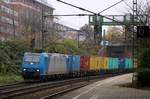 ALTD/VPS 185 516-2 mit Containerzug festgehalten bei der Durchfahrt in HH-Harburg.