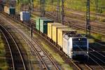 193 802 mit langem Containerzug aufgenommen bei der Durchfahrt in Buchholz in der Nordheide.