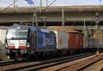 MRCE/boxXpress 193 853-9(REV/MMAL/16.01.14)mit Metallkistenzug rumpelt hier durch HH-Harburg.