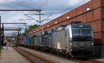 RP/TXL 6193 154 kam zwischdurch mit dem  italienischen Müllzug  in dem Bhf Pattburg gerollt.