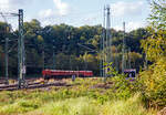 Die 187 162 (91 80 6187 162-3 D-DB) der DB Cargo AG zieht nun (am 04.10.2021) den Schotterzug (Schüttgutkippwagen der Gattung Fans) in den Rangierbahnhof Betzdorf (Sieg), wo sie den Zug abstellt.