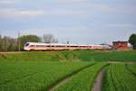 Der 411 006  Erfurt  rollt als ICE 1606 (Mnchen-Warnemnde) seinem vorletzten Halt Rostock Hbf entgegen.Geknipst am 09.05.2012 in Gragetopshof.