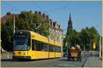 Auf der Augstbrcke kreuzt ein Tram ein Pferdefuhrwerk. 
23.Sept. 2010.