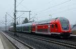 RE7/21075(Flensburg-Hamburg Hbf)mit Zuglok 112 147 verlässt hier Schleswig Richtung Rendsburg.