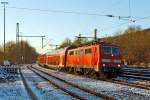   Die 111 147-5  (91 80 6111 147-5 D-DB) der DB Regio NRW fährt am 28.12.2014 mit dem RE 9 - Rhein Sieg Express (RSX) Aachen - Köln - Siegen in den Bahnhof Au/Sieg ein.