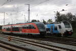 642 054 als RB 11(Wismar-Rostock-Tessin)bei der Ausfahrt im Rostocker Hbf,neben an hatte 4746 804 von der ODEG Pause.