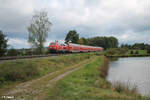 218 409-1 zieht südlich von Wiesau/Oberpfalz den RE2 RE4859 Hof - München.