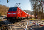 Die 146 001-3 (91 80 6146 001-3 D-DB) der DB Regio NRW schiebt am 11.03.2022 den RE 9 - Rhein Sieg Express (RSX) Siegen - Kln – Aachen vom Bahnhof Kirchen (Sieg) weiter in Richtung Kln,