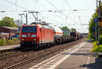 Die 185 156-7 (91 80 6185 156-7 D-DB) der DB Cargo AG fährt am 20.04.2018 mit einem gemischten Güterzug durch den Bahnhof Bonn-Beuel in Richtung Köln.