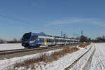 ET 318 auf dem Weg nach Mnchen am 24. Januar 2022 bei bersee am Chiemsee.