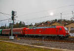 Die 185 083-3 (91 80 6185 083-3 D-DB) der DB Cargo fährt am 08.12.2021 mit einem sehr langen Coilzug (verm.