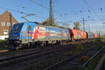 HSL 186 381 verlässt mit ein Getreidezug Emmerich am 8 November 2019.