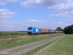 253 015-8 zieht bei Oberteich ein Containerzug nach Hof.