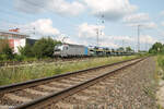 6193 155-9 zieht mit einem offenen Autotransportzug durch Nürnberg Hohe Marter.