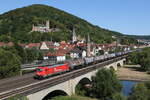 185 585 von  Rhein-Cargo  mit einem Kesselwagenzug bei der durchfahrt von Gemnden am 8.