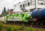 Bei Regen „Unterwegs mit Ökostrom“, die SIEMENS Smartron 192 056- 3 (91 80 6192 031-3 D-RHC), bzw. Lok 3001 der RheinCargo GmbH & Co. KG fährt man 03.08.2023 mit einem sehr langen Kesselwagenzug durch Niederschelderhütte in Richtung Köln. Die Ladung der Kesselwagen war laut Gefahrgutkennzeichnung (30/1202) Dieselkraftstoff beziehungsweise leichtes Heizöl.

Die Smartron wurde 2020 von Siemens Mobilitiy in München-Allach unter der Fabriknummer 22889 gebaut. 
