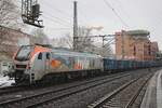 HVLE 159 007 zieht ein Ganzzug durch Hamburg-Harburg am 14 Februar 2026.