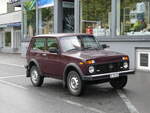 (275'896) - Lada - BE 758'100 - am 29. Mai 2025 beim Bahnhof Interlaken West