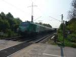 437016 der SNCF passiert am 21.04.2011 einen Bahnbergang im Norden von Lintorf.