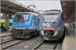 Mit der FS Trenitalia E 464 198 (und einer weiteren am Zugschluss) ist der Nachtzug von Roma Termini in Palermo angekommen, wobei der auf im Vordergrund stehende ME ALe 501 Lok und zu verdeckt. 

6. März 2026