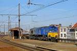 In eine der letzte Einsätse von ERS Railways Class 66 durchfahrt 6611 mit ein Leercontainerzug am 23 Márz 2011 Antwerpen-Dam.